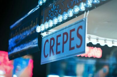 white and red Crepes signage